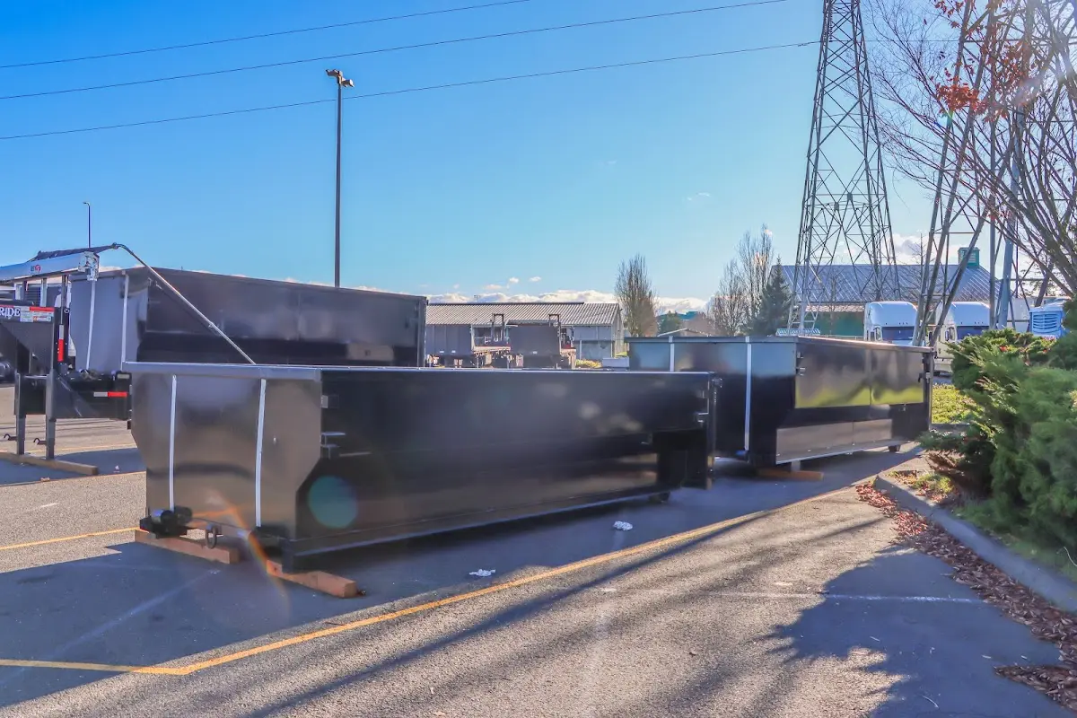 Roll-off dumpster ready for waste disposal at job site for Yard Waste Dumpster Rental in Alpena